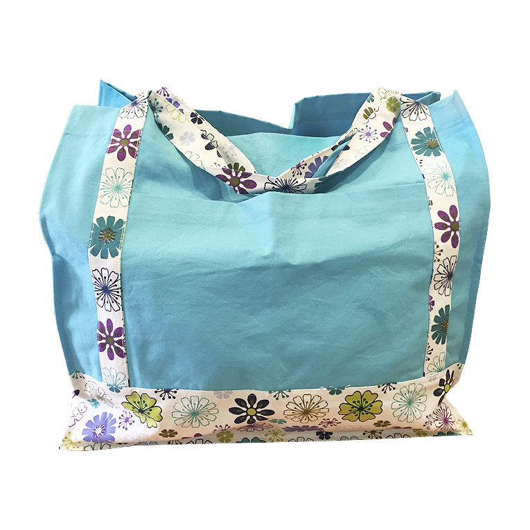 Bolsa azul con motivos florales